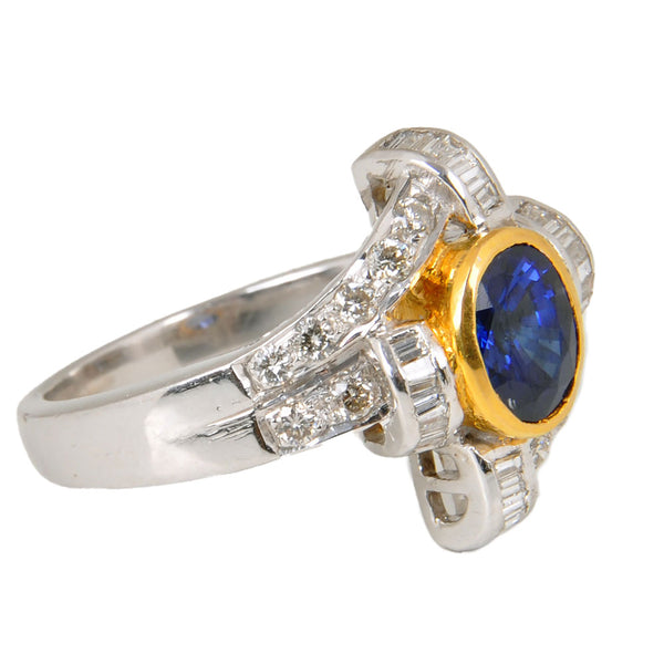 18KT White and Yellow Gold Ladies Ring with Oval Cut Natural Blue Sapphire & Baguette Cut Diamonds