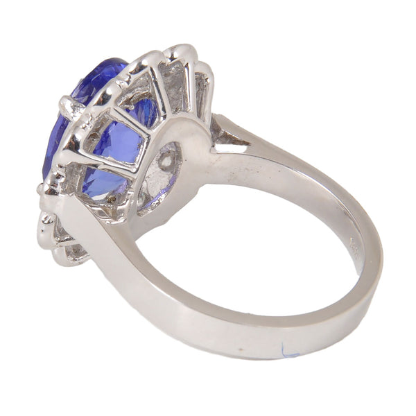 14KT White Gold Ladies Ring with Oval Cut Tanzanite & Bezel Set Round Brilliant Cut Diamonds