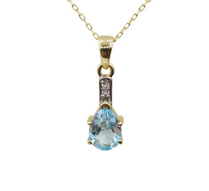 Sterling Silver Blue Topaz 10x7mm Pendant with Chain