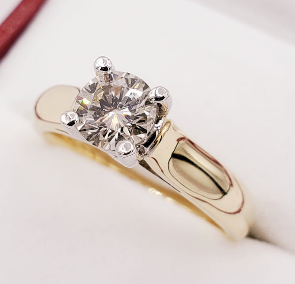 14kt yellow and white gold ring with one prong set round brilliant cut diamond 0.72ct