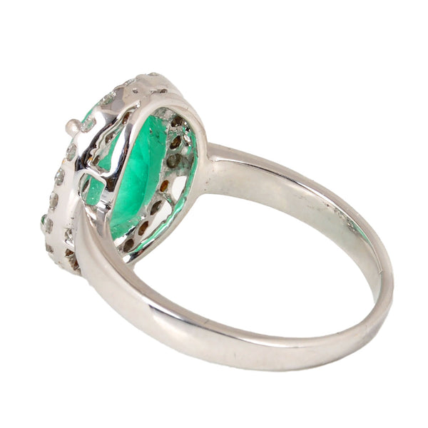 18KT White Gold Ladies Ring with Prong Set Oval Cut Emerald & Round Cut Diamonds